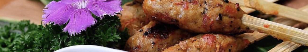 Tasty snacks, spicy spring rolls, small dishes of traditional Indonesian street food 